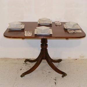 An Edwardian Mahogany Supper Table.