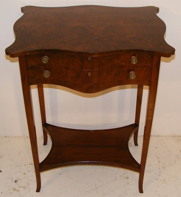 A Late 19th Century Walnut Work Table.