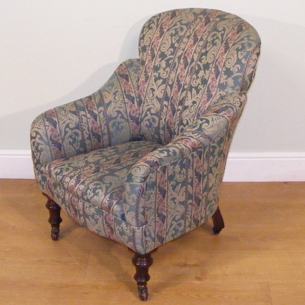 A Tub Armchair Dating From The 1800's